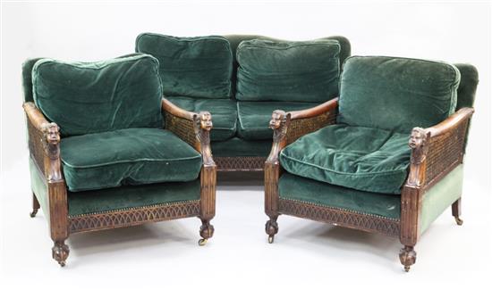 An Edwardian mahogany three piece bergere suite,